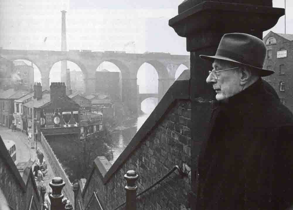 Lowry looking over Stockport